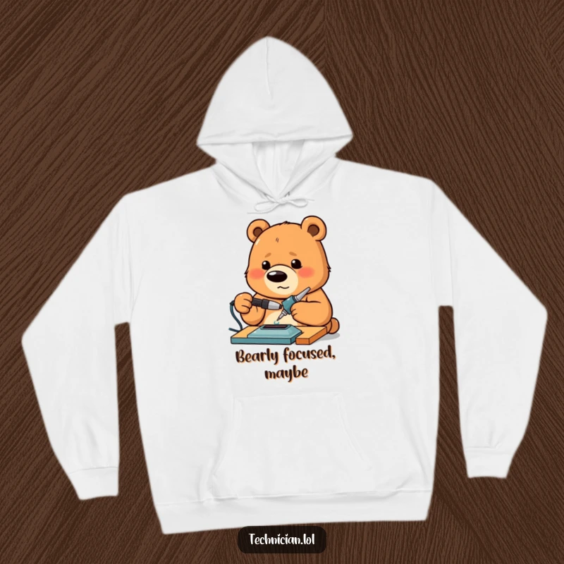 Funny Bear Hoodie featuring a proud bear intensely concentrating on soldering, offering warmth and a touch of maker humor.
