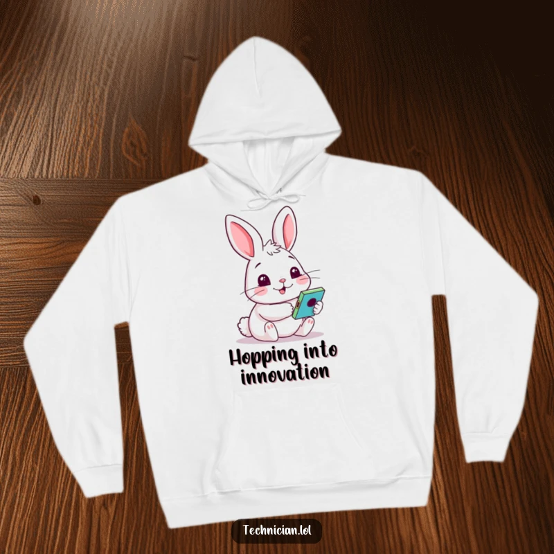 Funny hoodie depicting a cheery rabbit with a curious face, testing a colorful gadget with enthusiasm and wonder.