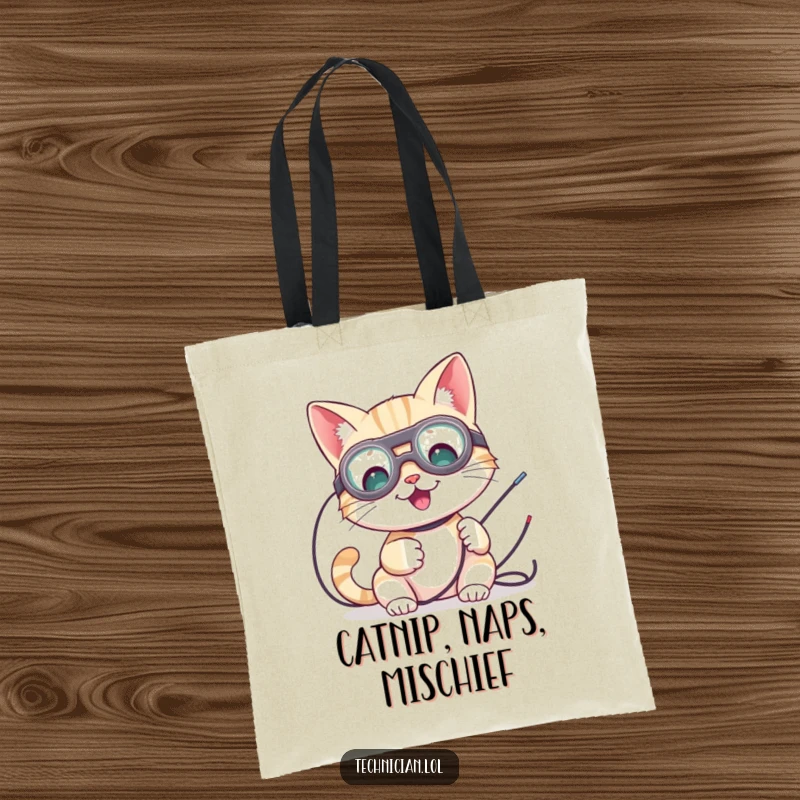 Funny tote bag with a cute cat wearing goggles, tinkering with wires, a stylish and humorous accessory.